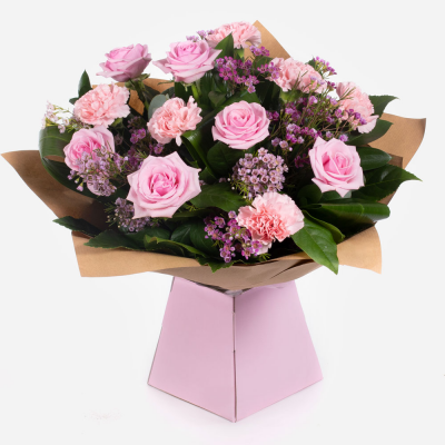 Strawberry Twist
 - This sweet arrangement of roses with carnations and foliage to compliment. Your recipient is sure to be overjoyed at such a heartfelt statement.
